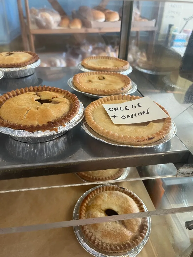 Hot cheese and onion pies at The Bakery Cafe Heywood, baked by Ernill's Bakery in Bury